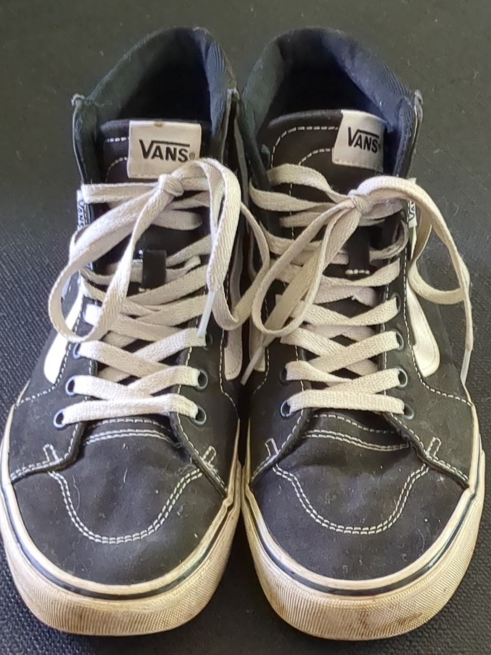 Vans High-Top Skate Shoes in Black and White